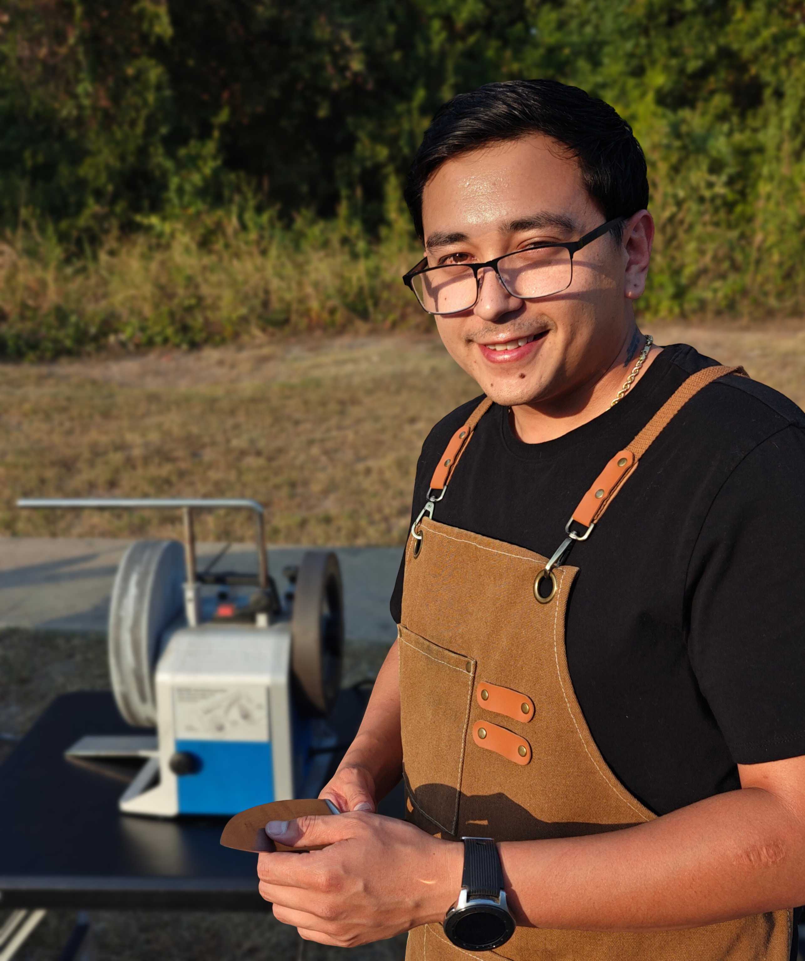 Michael Kempf, owner of Seriously Fast Sharpening, at his sharpening setup in Austin, TX